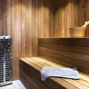 Huum Steel Mini 3.5kw Electric Sauna Heater in a sauna
